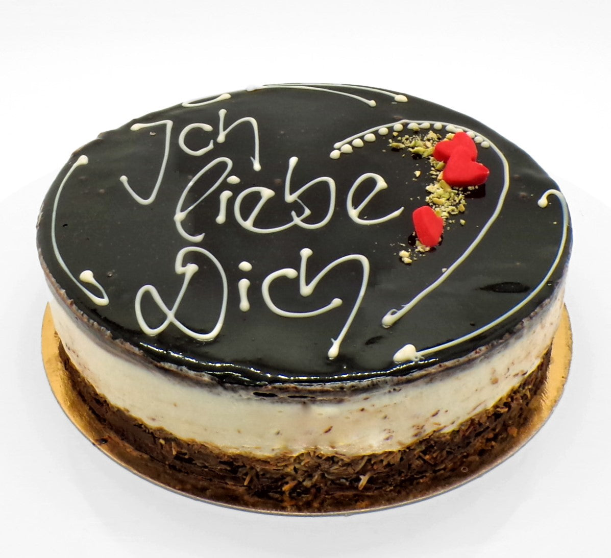 New York Cheesecake nach Dubai art mit weißer Aufschrift: Ich liebe Dich und roten Herzen